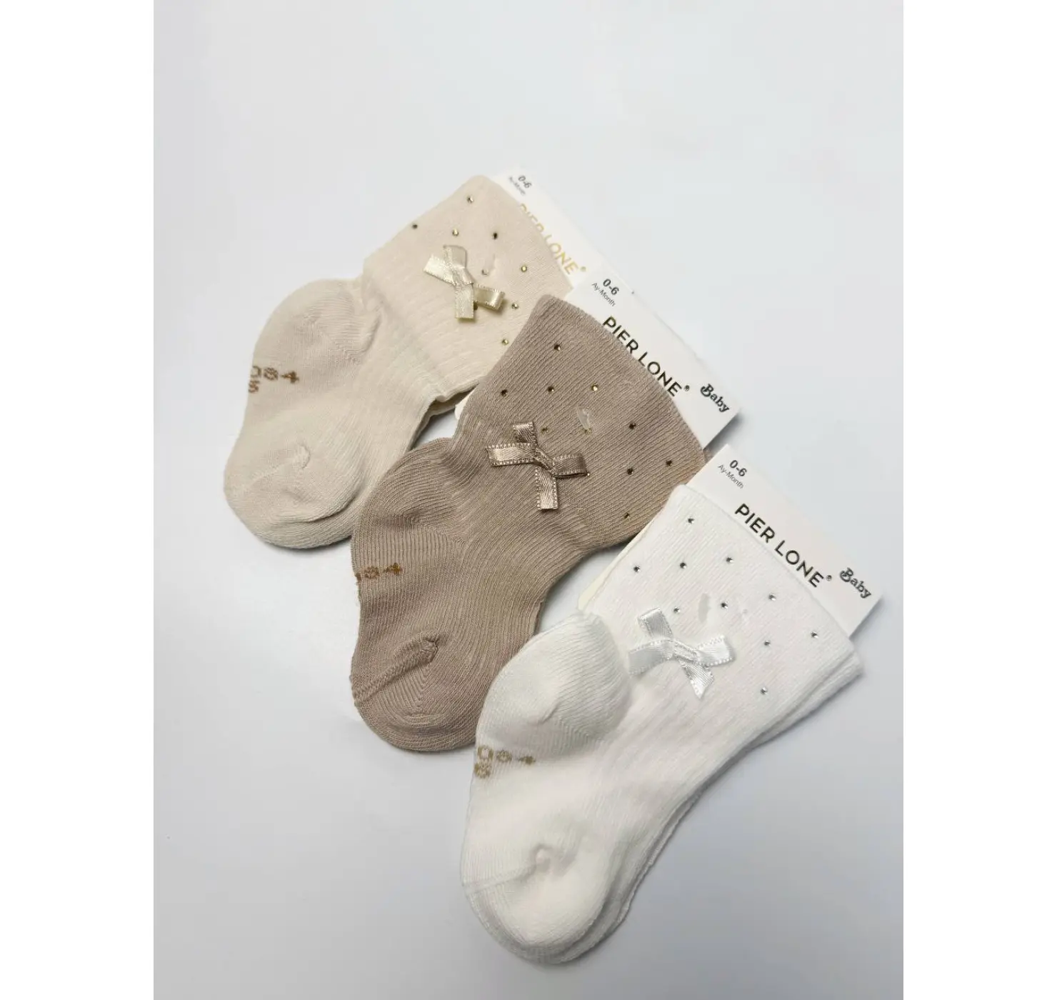 Шкарпетки бантик/ страз. Колір: Молочний.   Розмір: 0-6 міс.  PierLone