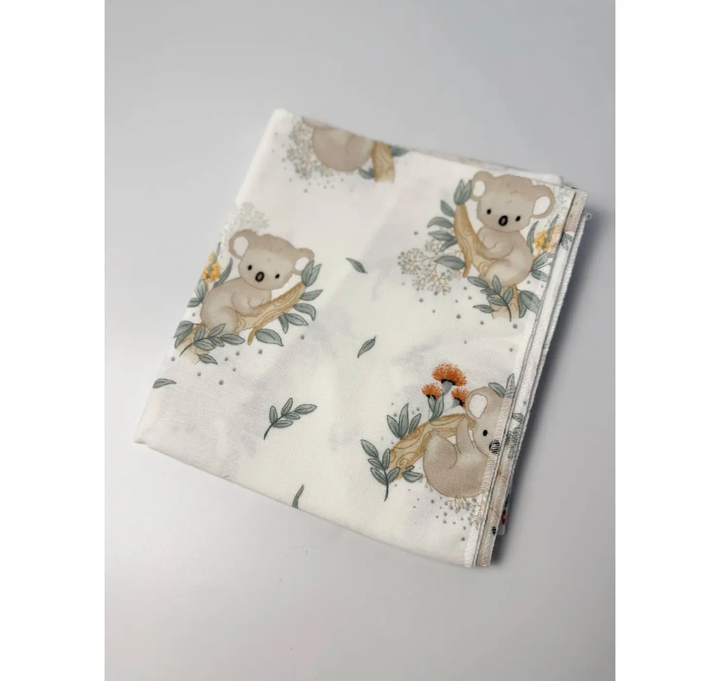 Байкова пелюшка. Принт: Коала на гілочці. Матеріал: Байка. Колір :Зелений/Бежевий | Розмір: 90х80.Home.mama